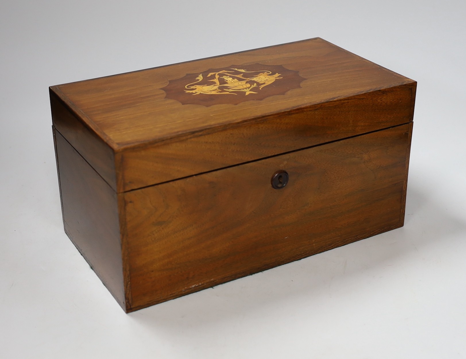 A 19th century with later inlay mahogany tea caddy, 31cms wide, 16cms high